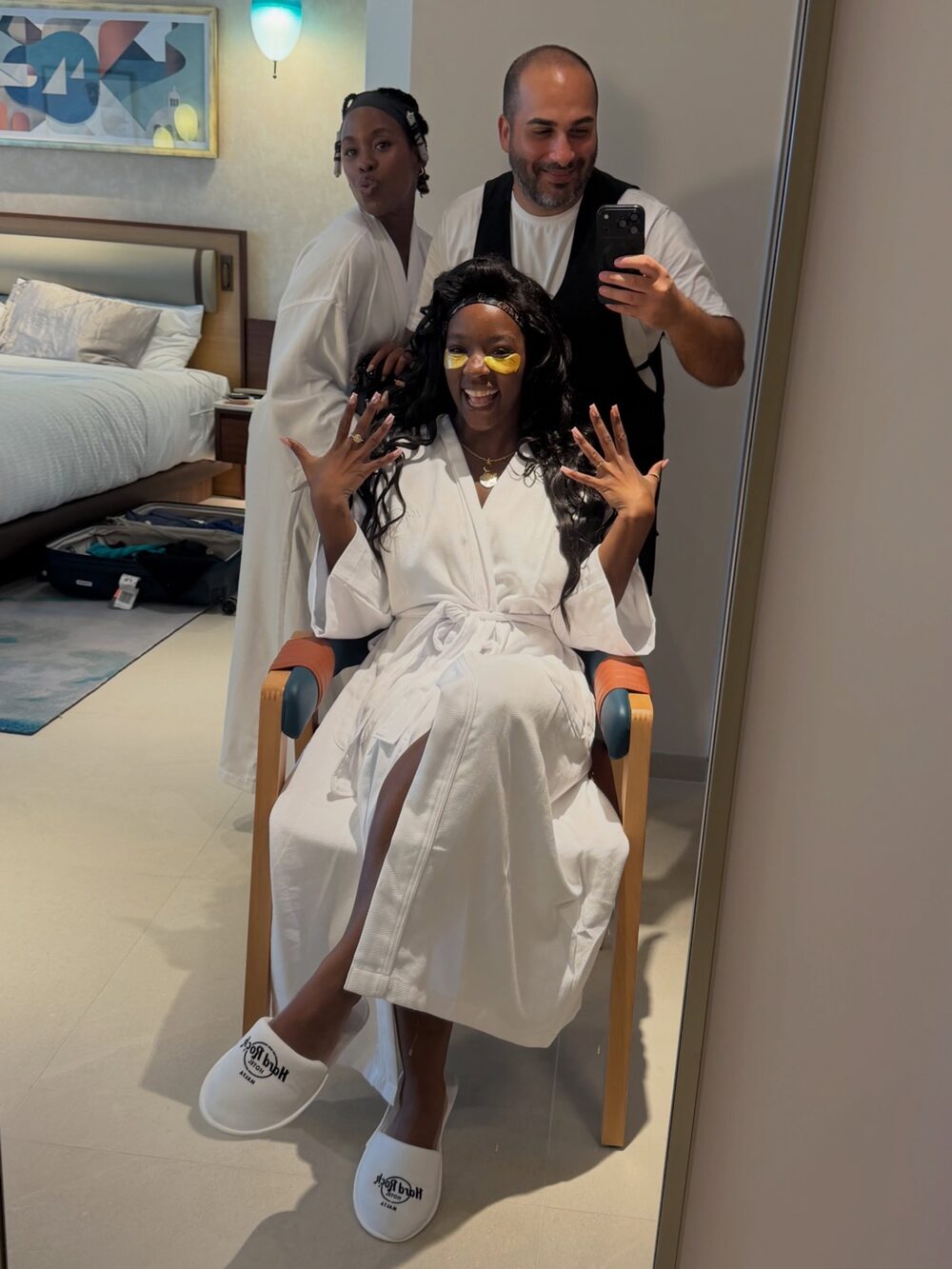 Francesco styling the bride in her hotel suite on the wedding morning